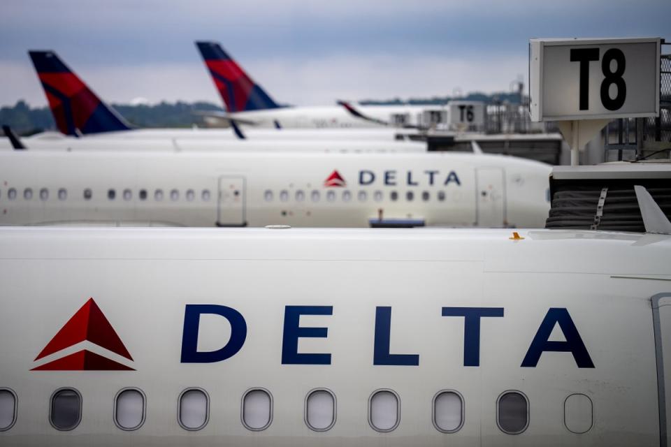 Delta planes park at Hartsfield-Jackson Atlanta International Airport. A tire on a Delta plane burst in a maintenance area at the airport, killing two airline employees and injuring a third (Getty Images)