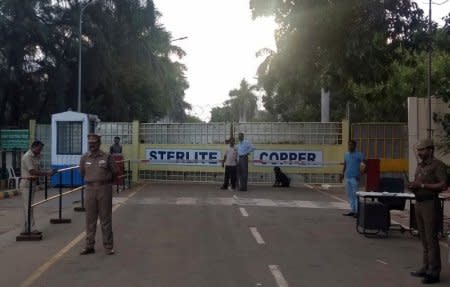 FILE PHOTO: Police stand guard outside a copper smelter controlled by London-listed Vedanta Resources in Thoothukudi in the southern state of Tamil Nadu, India, May 28, 2018. REUTERS/Sudarshan Varadhan/File Photo