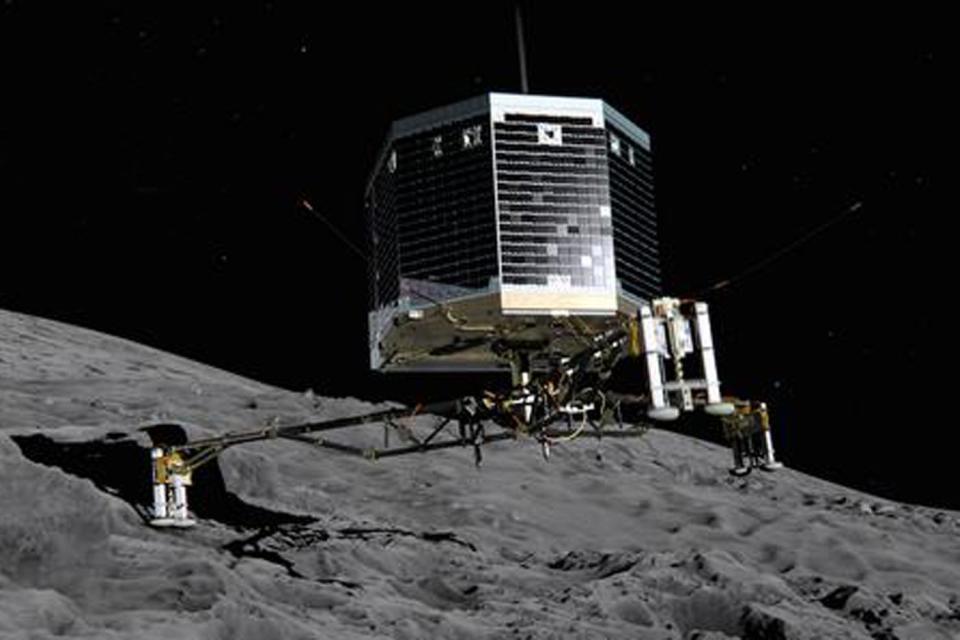 Mission: photo illustration by the European Space Agency (ESA) shows the Philae lander descending onto the 67P/Churyumov-Gerasimenko comet (Picture: Twitter/‏@ESA_Rosetta)