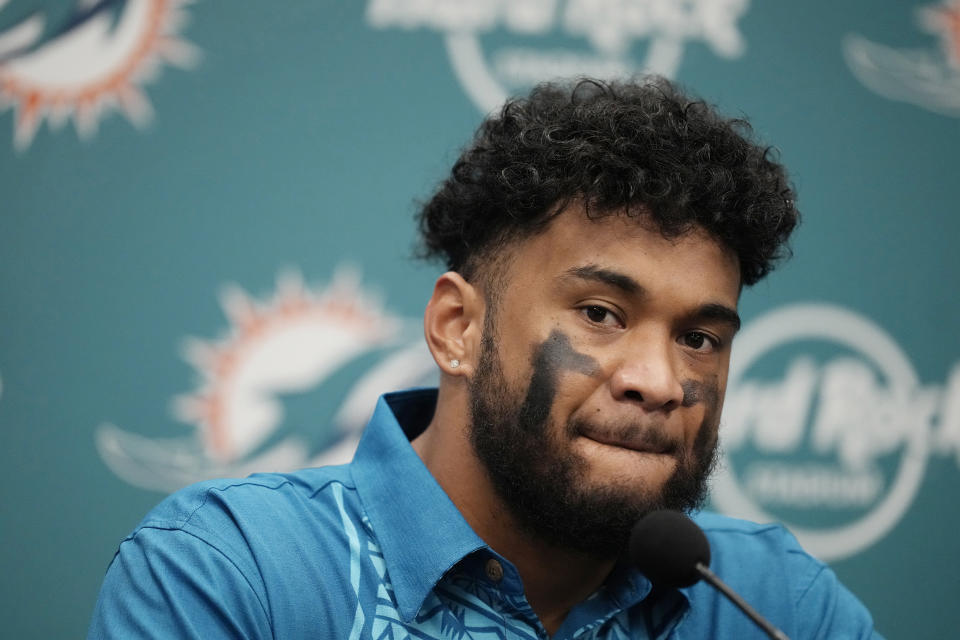 Miami Dolphins quarterback Tua Tagovailoa (1) listens to a question during a press conference following an NFL football game, Tuesday, Dec. 12, 2023, in Miami. The Titans defeated the Dolphins 28-27. (AP Photo/Rebecca Blackwell)