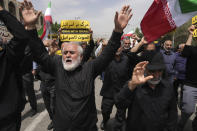 Worshippers chant slogans during a protest against Sweden after the Nordic nation allowed an Iraqi man to insult the Muslim holy book, the Quran, after their Friday prayers in Tehran, Iran, Friday, July 21, 2023. (AP Photo/Vahid Salemi)