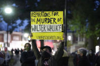 Protesters gather for a march Tuesday Oct. 27, 2020, in Philadelphia. Hundreds of demonstrators marched in West Philadelphia over the death of Walter Wallace, a Black man who was killed by police in Philadelphia on Monday. Police shot and killed the 27-year-old on a Philadelphia street after yelling at him to drop his knife. (AP Photo/Matt Slocum)