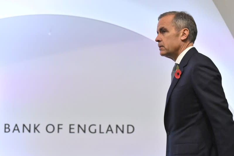 FILE PHOTO: Bank of England Governor Mark Carney attends a Bank of England news conference, in the City of London