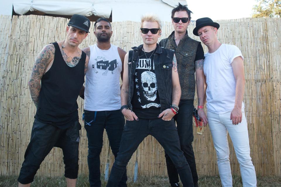 Deryck Whibley, Jason McCaslin, Tom Thacker, Dave Baksh, Frank Zummo from Sum 41 are posing for Photo Session at Rock en Seine on August 28, 2016 in Paris, France