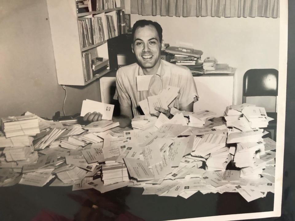 Al Fiori is shown with plenty of postcards related to a 1960s-era promotion/contest at the Los Angeles area radio station where he worked.