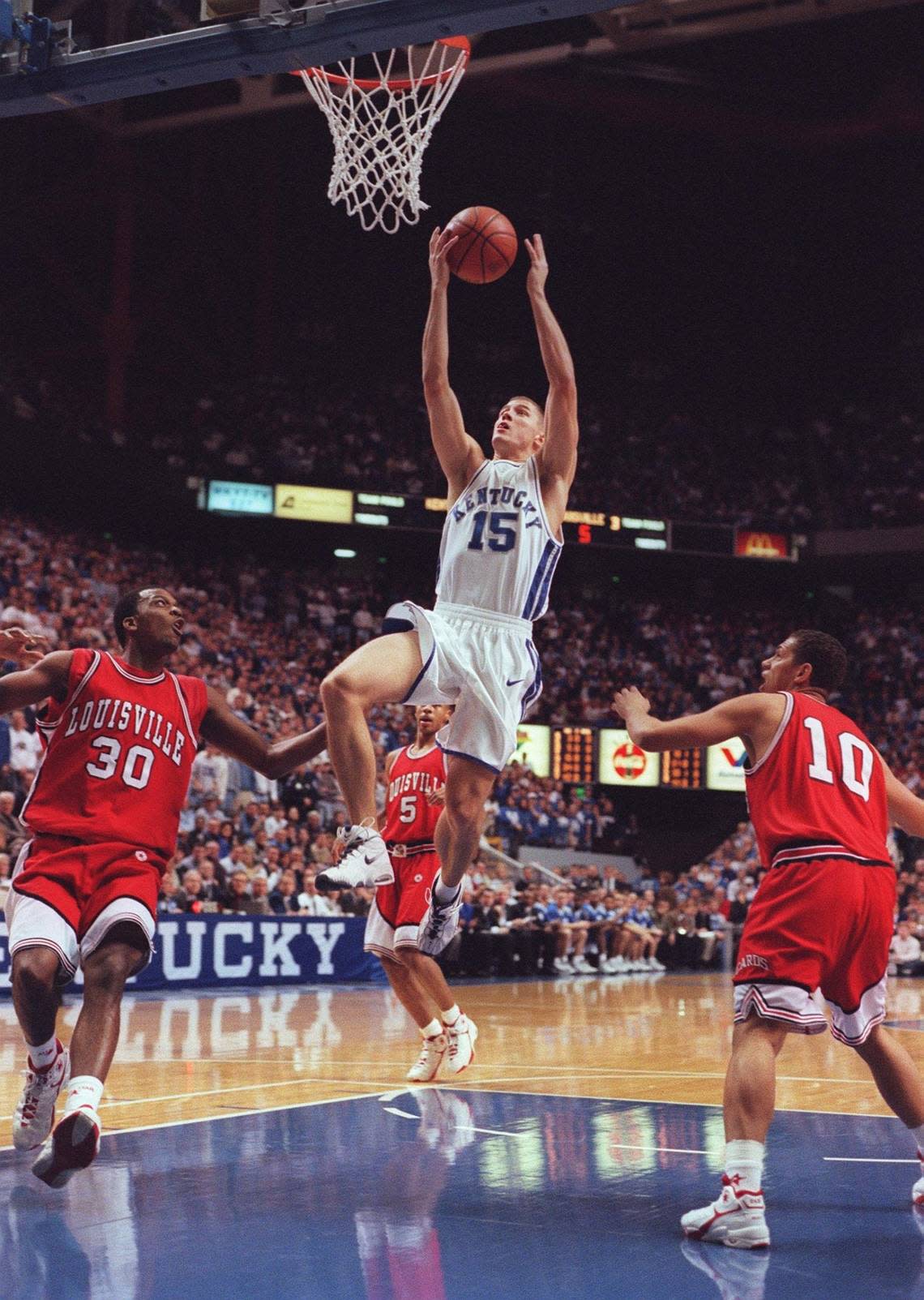Jeff Sheppard (15), the father of current Kentucky freshman star Reed Sheppard, led UK with 18 points when the 1997-98 Wildcats were stunned 79-76 by Louisville at Rupp Arena. That season, the Wildcats went on to win the NCAA title, while the Cardinals finished 12-20. LEXINGTON HERALD LEADER