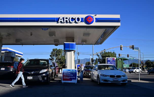 PHOTO: People get gas for their vehicles at a petrol station, Oct. 19, 2022, in Alhambra, California. (Frederic J. Brown/AFP via Getty Images)