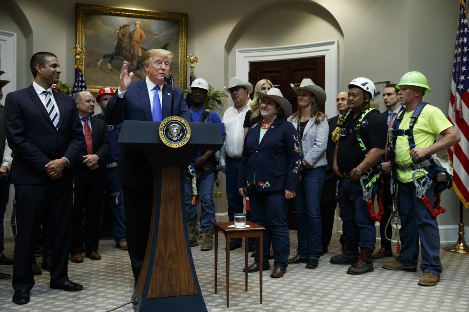 President Donald Trump gestures as he speaks about the deployment of 5G technology in the United States during an event in the Roosevelt Room of the White House, Friday, April 12, 2019, in Washington. (AP Photo/Evan Vucci)