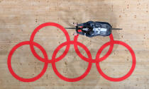 <p>An overview shows a cyclist from New Zealand warming up before a track cycling event during the Tokyo 2020 Olympic Games at Izu Velodrome in Izu, Japan, on August 8, 2021. (Photo by Greg Baker / AFP)</p> 