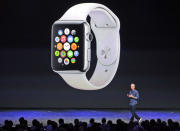 File - Apple CEO Tim Cook introduces the new Apple Watch on Tuesday, Sept. 9, 2014, in Cupertino, Calif. The Apple Watch created a device that made it possible to wear something akin to a smartphone on your wrist because it included cellular capability. (AP Photo/Marcio Jose Sanchez, File)