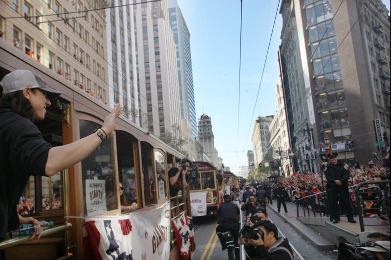 San Francisco Giants ace Tim Lincecum waves from a motorized cable car in a massive parade and civic celebration for the World Champion San Francisco Giants in San Francisco on November 3, 2010. On January 17, 1871, Andrew Hallidie received a patent for a cable car system that went into service in San Francisco in 1873. File Photo by Terry Schmitt/UPI