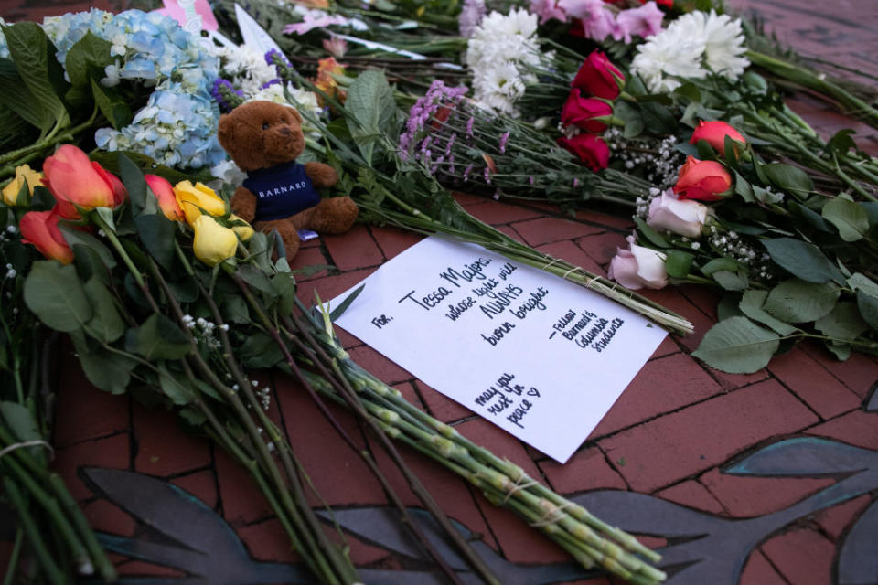 Flowers are laid near the entrance of Barnard College on December 12, 2019 in New York City. | Getty Images—2019 Getty Images