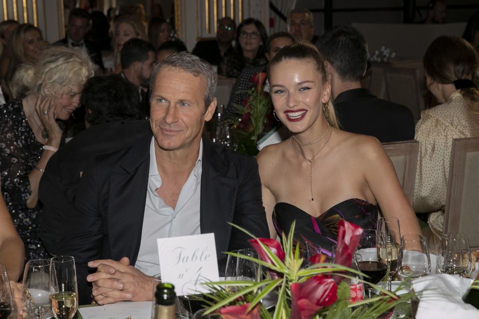 Vladislav Doronin (left) sitting next to Kristina Romanova (right)