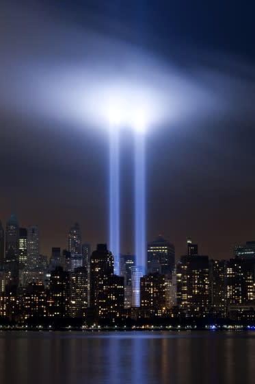 The Tribute in Light shines above lower Manhattan in New York, on the 10th anniversary of the September 11 attacks on the United States. (Photo by Brooks Kraft LLC/Corbis via Getty Images)
