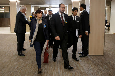 Syria's main opposition High Negotiations Committee (HNC) leader Nasr al-Hariri, center, arrives to take part in a round of negotiation with UN Special Envoy of the Secretary-General for Syria Staffan de Mistura, back left, during the Intra Syria talks, at the European headquarters of the United Nations in Geneva, Switzerland, Friday, March 3, 2017. REUTERS/Salvatore Di Nolfi/Pool