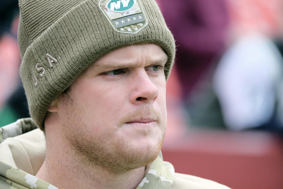 FILE - New York Jets quarterback Sam Darnold warms up ahead of a NFL football game between the Washington Redskins and the New York Jets, Sunday, Nov. 17, 2019, in Landover, Md. Whether it's the Jets giving away three extra second-round picks to move up and take San Darnold third overall in 2018 or the 49ers giving up three first-round picks to draft Trey Lance third overall in 2021 only to have him start four games his first two seasons, there have been many misses. (AP Photo/Mark Tenally, File)
