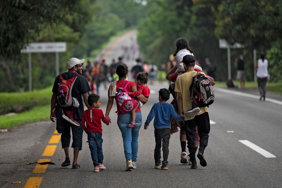 Migrants taking part in a caravan heading to the U.S. walk from Huixtla to Escuintla, Chiapas state, Mexico, on June 9, 2022. / Credit: PEDRO PARDO/AFP via Getty Images