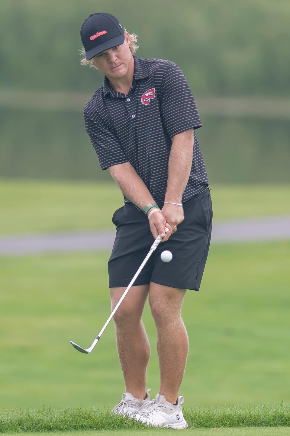 Nic Hofman chips during the championship flight of the Lafayette Men’s City Golf Tournament, Sunday Jul. 28, 2024, at Purdue’s Kampen golf course in West Lafayette, Hofman won 5,3.