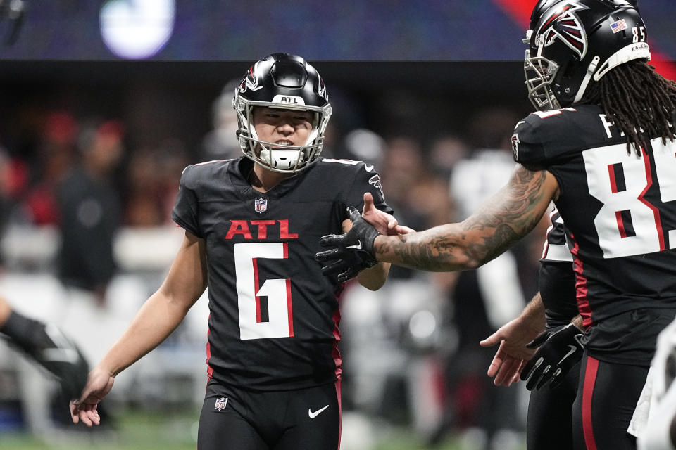 Atlanta Falcons place kicker Younghoe Koo (6) celebrates with teammates aafter kicking a field goal during the first half of an NFL football game against the Tampa Bay Buccaneers, Sunday, Dec. 10, 2023, in Atlanta. (AP Photo/Brynn Anderson)