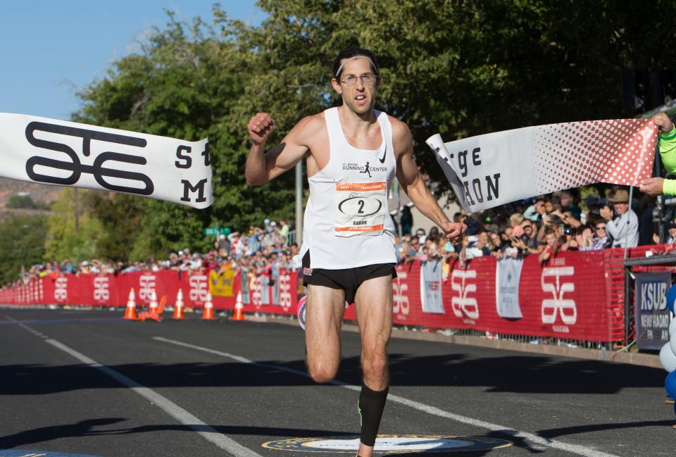 Aaron Metler, a City of St. George employee and longtime runner, crosses the finish line to win his fourth St. George Marathon on Oct. 2, 2021. This year's race is scheduled for Saturday, with Metler back to run again and defend his title.