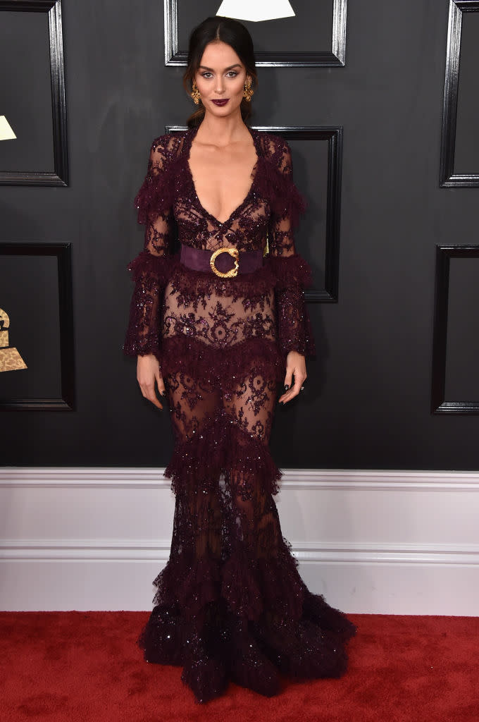<p>Barely-there lace was a big red carpet trend — and while many stars opted for light versions, we love Nicole Trufio’s dark and sultry version. </p>