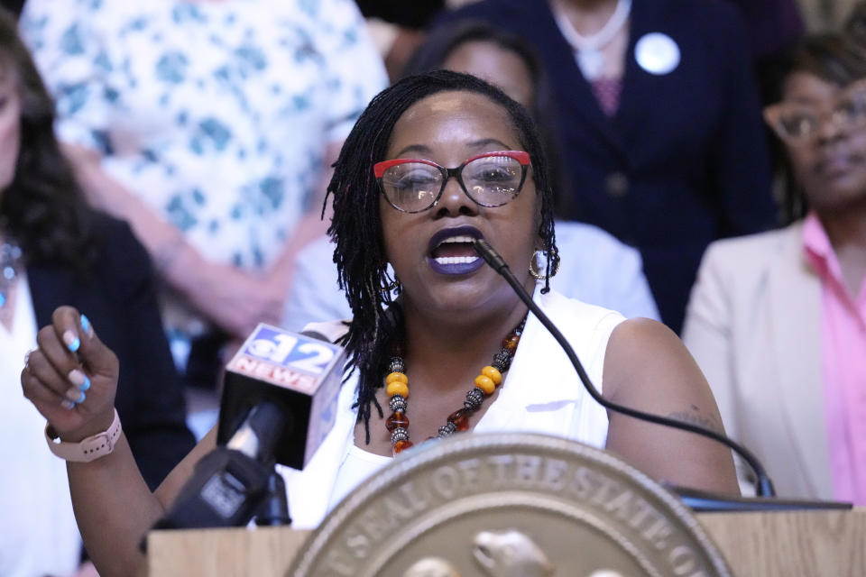 Gladys Scott, a former felon, speaks to reporters following a hearing where a group of legislators were told about the difficulties that some former felons face in regaining their right to vote, Wednesday, April 17, 2024, at the Mississippi Capitol in Jackson. (AP Photo/Rogelio V. Solis)