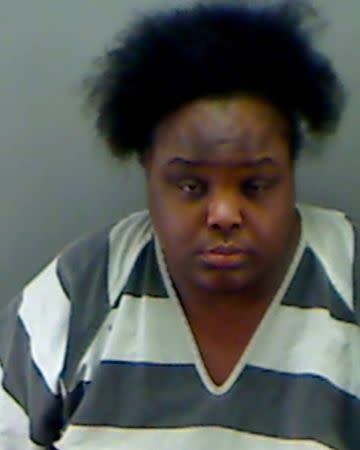 Charity Johnson, 31, is shown in this police booking photo provided by the Longview Police Department in Longview, Texas on May 15, 2014. REUTERS/Longview Police Dept/Handout via Reuters
