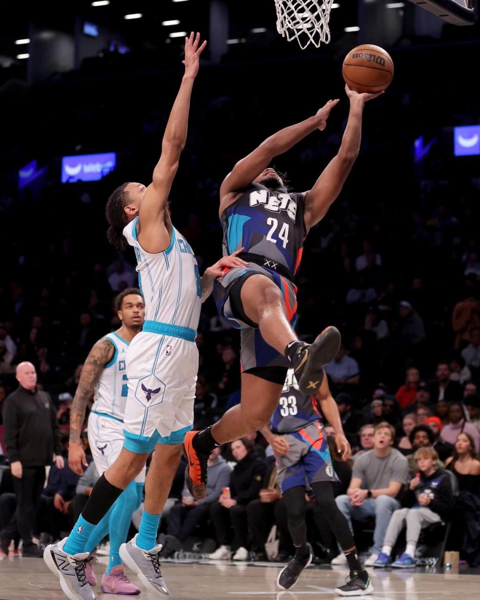 Brooklyn Nets guard Cam Thomas (24) shoots against Charlotte Hornets guard Nick Smith Jr. (8) during the second quarter at Barclays Center. Brad Penner/USA TODAY NETWORK