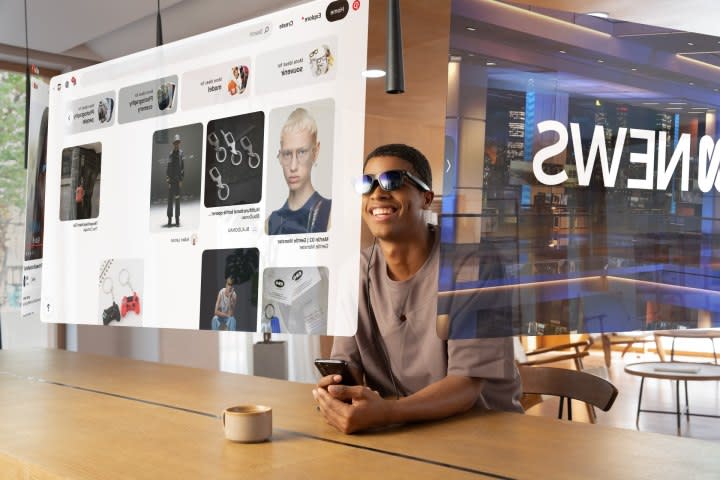 A render simulates what you see when wearing Viture One Pro smart glasses.