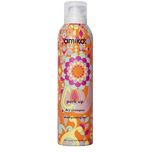 colorful bottle of Amika dry shampoo