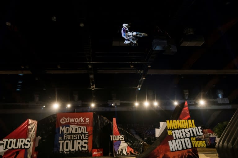 Australian rider Pat Bowden performs during a motocross freestyle show in Tours, on April 7, 2018