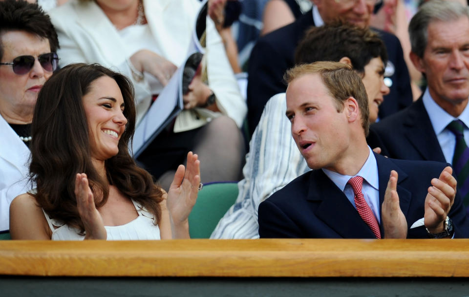 <div class="caption-credit">Photo by: Photo by Clive Mason/Getty Images</div><div class="caption-title"><b>They did a lot of laughing.</b></div> <br> Here they are at Wimbledon right after their honeymoon, in one of the hundreds of photos where they're cracking each other up. <br>