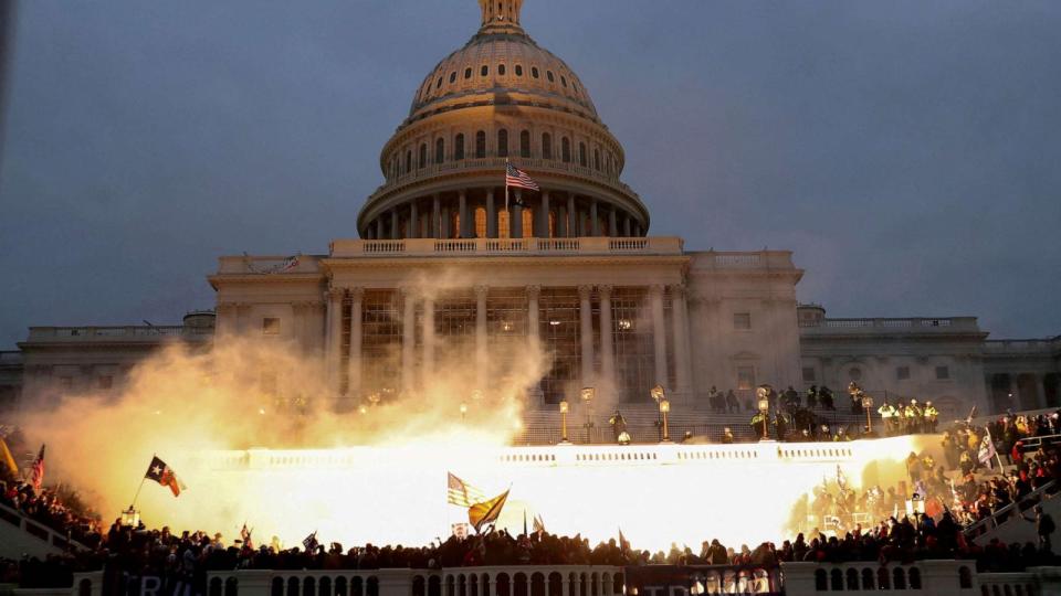 PHOTO: FILE - An explosion caused by a police munition is seen while supporters of U.S. President Donald Trump gather in front of the U.S. Capitol Building in Washington, Jan. 6, 2021. (Leah Millis/Reuters, FILE)