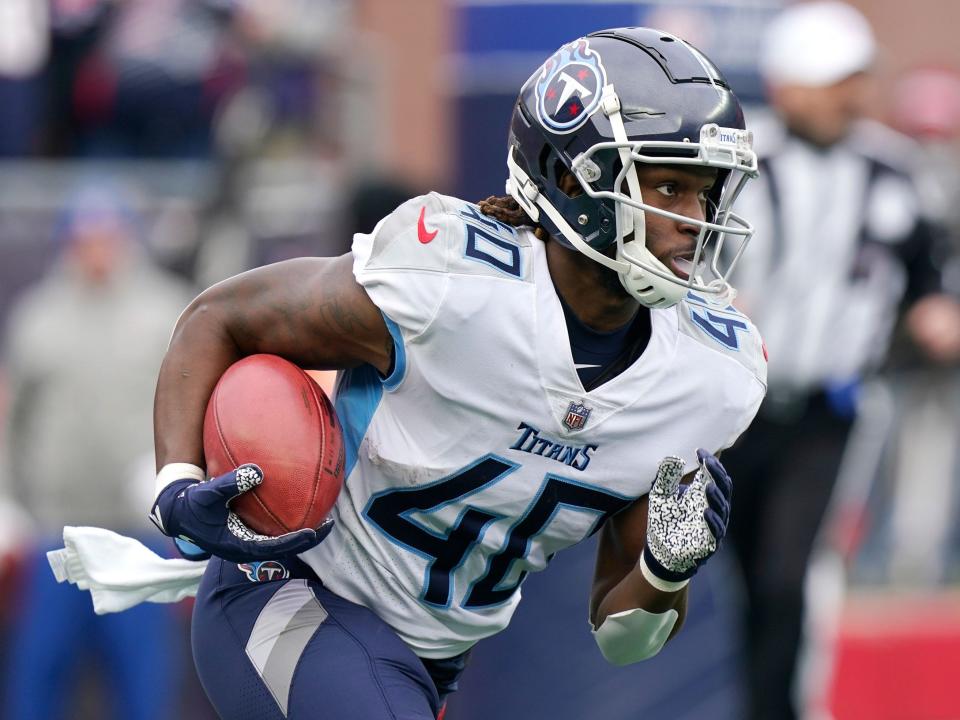 Dontrell Hilliard makes a run against the New England Patriots.