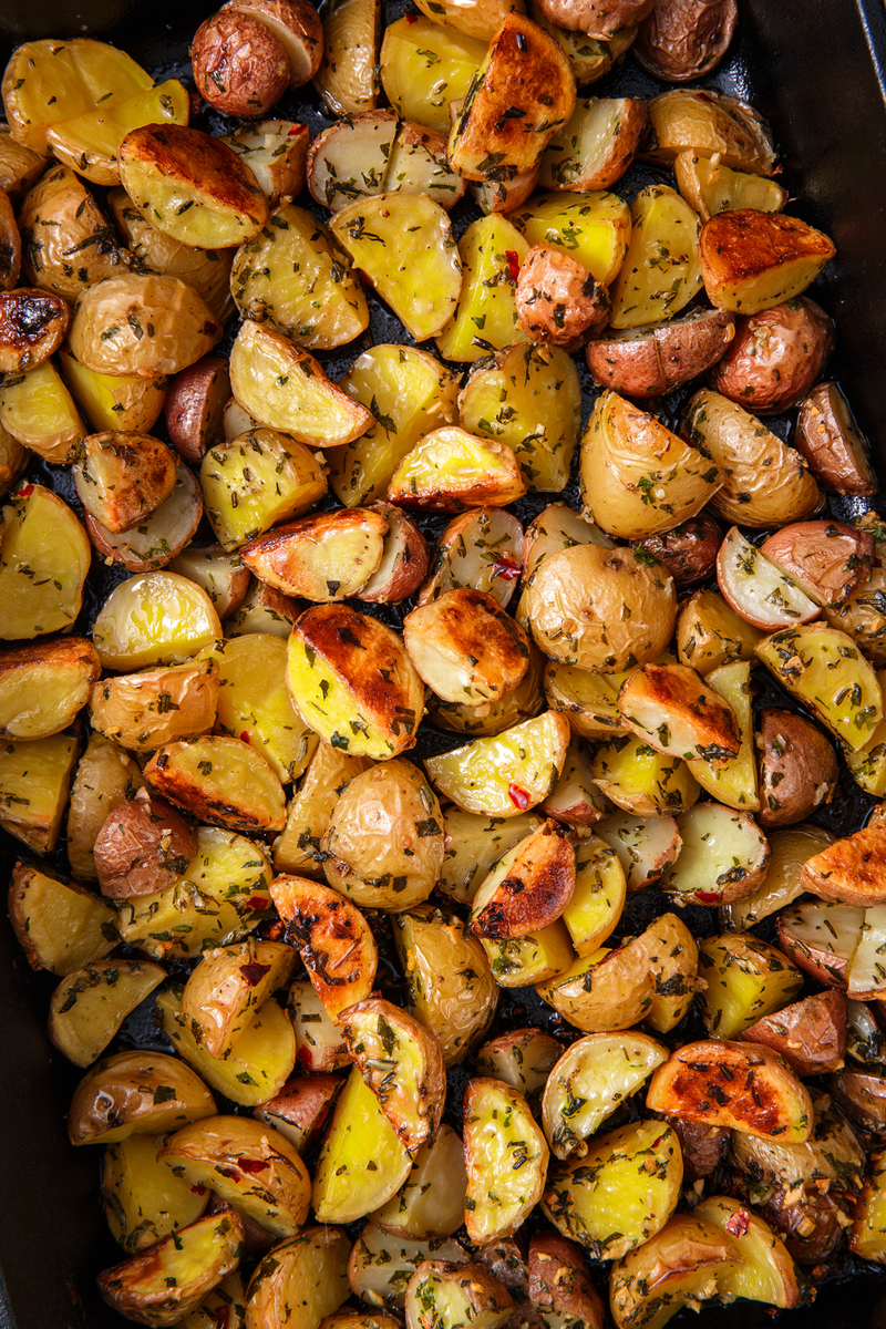 <p>Is there anything better than a perfectly roasted potato? The test kitchen can devour a large pan of them like it's nothing and feel no shame. </p><p>Get the <a href="https://www.delish.com/uk/cooking/recipes/a28786247/herb-roasted-potatoes/" rel="nofollow noopener" target="_blank" data-ylk="slk:Herb Roasted Potatoes;elm:context_link;itc:0;sec:content-canvas" class="link ">Herb Roasted Potatoes</a> recipe.</p>