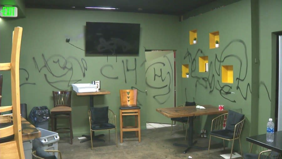 Graffiti left by a suspect who burglarized and vanadalized El Zarape on Feb. 26, 2024. (KTLA)