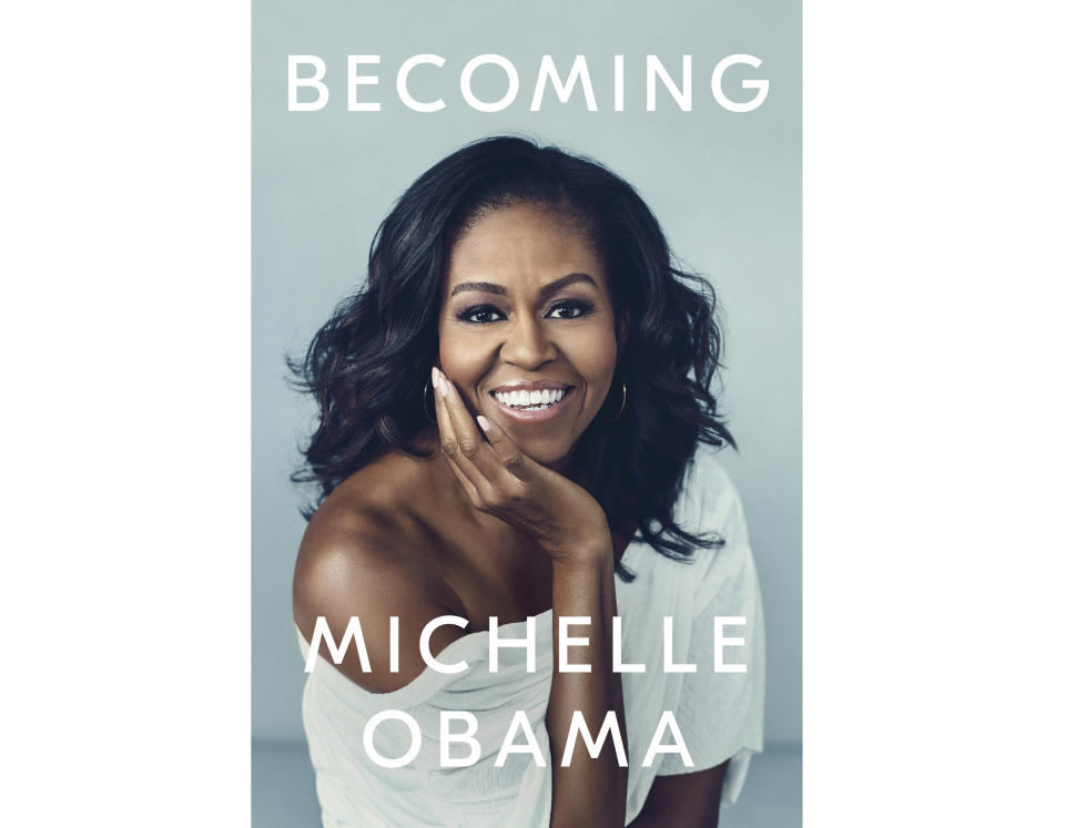 This cover image released by Crown shows "Becoming," by Michelle Obama. Crown Publishing told The Associated Press on Friday that the former first lady’s memoir had sold more than 725,000 copies after its first day of publication. “Becoming” came out Tuesday, the same day Obama launched a national book tour. (Crown via AP)