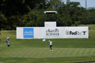 Dustin Johnson putts on the 13th green during practice for the Charles Schwab Challenge golf tournament at the Colonial Country Club in Fort Worth, Texas, Wednesday, June 10, 2020. (AP Photo/David J. Phillip)