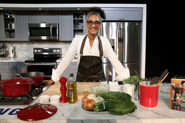 NEW YORK, NY – OCTOBER 17: Celebrity Chef Carla Hall prepares food on stage during Grand Tasting presented by ShopRite featuring Samsung culinary demonstrations presented by MasterCard – Food Network & Cooking Channel New York City Wine & Food Festival presented by FOOD & WINE at Pier 94 on October 17, 2015 in New York City. (Photo by Neilson Barnard/Getty Images for NYCWFF)