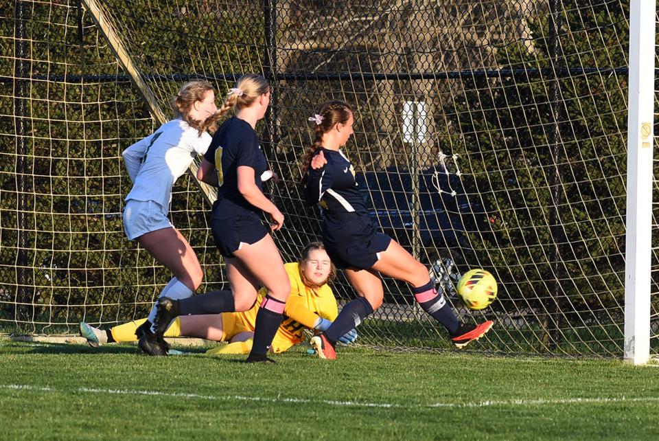 Hartland's Alyse Daavettila scores one of her five goals during a 9-0 victory over Howell Thursday, April 25, 2024.