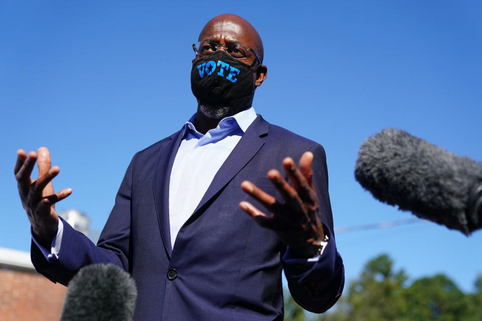 Democratic U.S. Senate candidate Rev. Raphael Warnock speaks to the media at a campaign event on October 3, 2020 in Lithonia, Georgia. (Elijah Nouvelage/Getty Images)