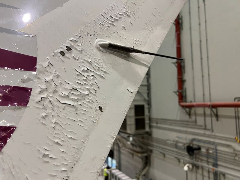 FILE PHOTO: Surface damage seen on Qatar Airways' airbus A350 parked at Qatar airways aircraft maintenance hangar in Doha
