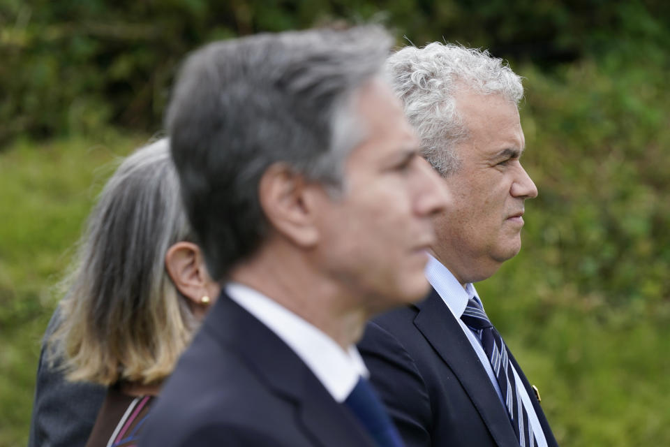 FILE - Secretary of State Antony Blinken, front, and Jeff Zients, White House coronavirus response coordinator, right, listen as President Joe Biden speaks about his administration's global COVID-19 vaccination efforts ahead of the G-7 summit, Thursday, June 10, 2021, in St. Ives, England. (AP Photo/Patrick Semansky, File)