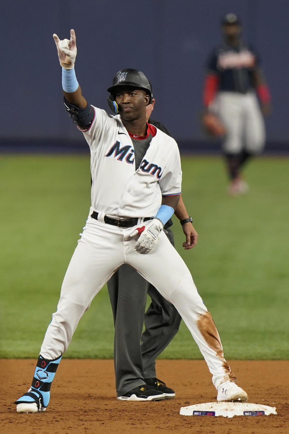 Miami Marlins' Jesus Sanchez celebrates after hitting a double during the third inning of a baseball game against the Atlanta Braves, Monday, Oct. 3, 2022, in Miami. (AP Photo/Wilfredo Lee)