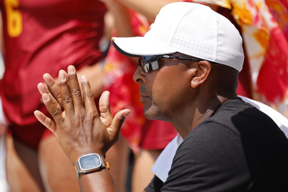 USC coach Dain Blanton looks on during a match against UCLA during the beach volleyball national championship final.