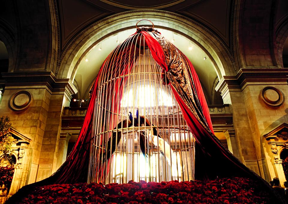 A gilded cage of peacocks greets visitors at the 2017 Met gala.