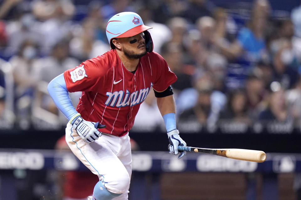 Miami Marlins' Miguel Rojas runs after hitting a single during the fourth inning of a baseball game against the New York Yankees, Saturday, July 31, 2021, in Miami. (AP Photo/Lynne Sladky)