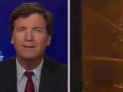 Tucker Carlson chuckles after showing video of Capitol police officer Michael Fanone saying he was traumatized by the 6 January insurrection. (screengrab)