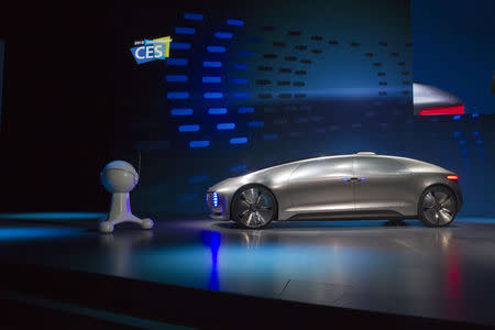 The Mercedes-Benz F015 Luxury in Motion autonomous concept car is shown on stage. REUTERS/Steve Marcus