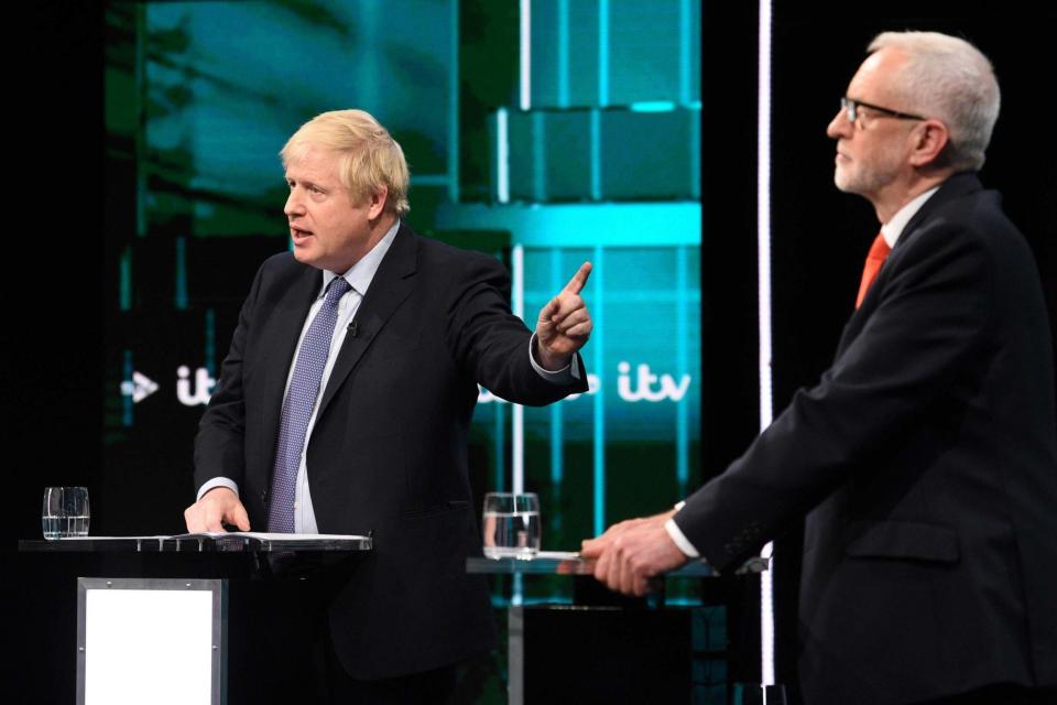 Prime Minister Boris Johnson (L) and Labour Party leader Jeremy Corbyn on ITV (AFP via Getty Images)